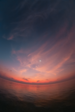 Line of planets and the Moon in the colorful sky on 23 February 2023 over Thoddo Island.