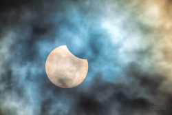 Partial solar eclipse on 29 March 2025 through clouds Partial solar eclipse on 29 March 2025 through clouds