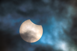 Partial solar eclipse on 29 March 2025 through clouds Partial solar eclipse on 29 March 2025 through clouds
